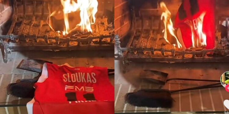 Οπαδός του Ολυμπιακού άναψε το τζάκι εν μέσω καύσωνα για να κάψει τη φανέλα του Σλούκα! (Bίντεο)